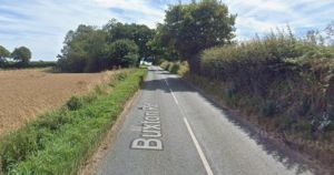 Crash blocks road through Norfolk village