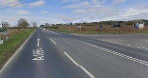 Two people taken to hospital after crash on busy road near airbase