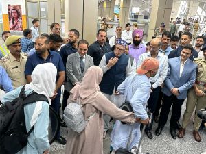 Hajis return home: First batch lands in Srinagar, received by CM Omar