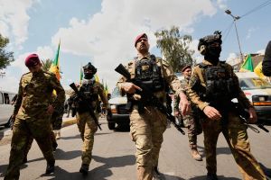 Powerful Iran-backed militias claim they’ll start handing in weapons to Iraqi authorities