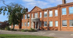 Ofsted praises school but highlights inconsistent writing standards