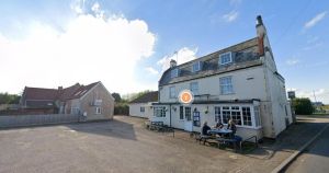 Former office next to village pub can become a home