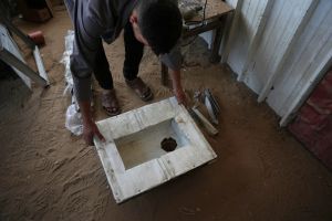 Gazans resort to makeshift toilets amid sanitation crisis in Strip’s vast tent camps