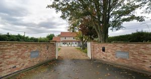 Woman allowed to keep chicken coop and garage built without planning permission