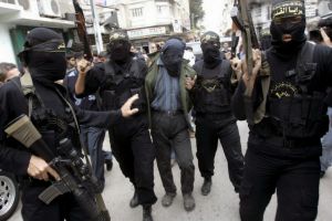 Hamas Disarms for Cameras, Kills for Power