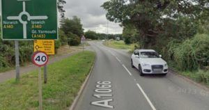 Delays after coach and car crash near busy roundabout