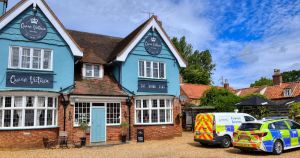 Police and forensic team attend incident near village pub
