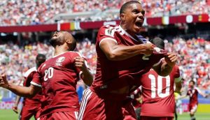 Qatar earns first-ever World Cup point with 94th-minute draw