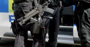 Armed police swoop on city street