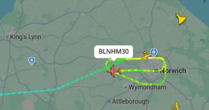 Large military plane circling Norfolk