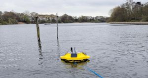 Why are mysterious yellow 'spaceships' floating on a Norfolk lake?