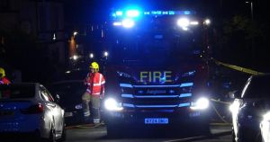 Man bailed after building blaze sees blue lights fill street