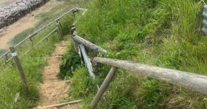 Vandals damage beach steps to WW2 site with wood burned on bonfire
