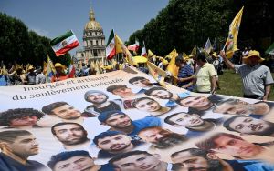 France arrests 20 after banning rally against political executions in Iran