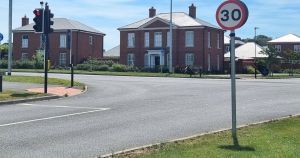 Speed signs hidden by bin bags for two years FINALLY uncovered