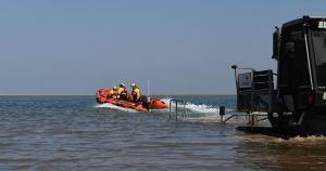 Beachgoer stranded on sandbank after tide cuts them off