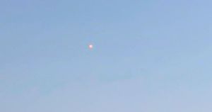 Mysterious glowing 'orb' spotted over seaside town