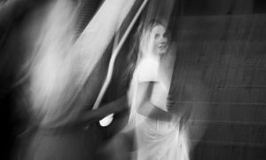 Her dad died in 2018. He’s in her wedding photos anyway.