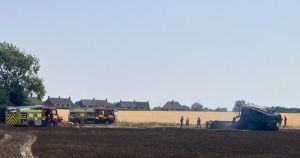 Photos show combine harvester destroyed in fire that engulfed fields