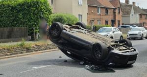 Man in hospital after Audi flips upside down in crash