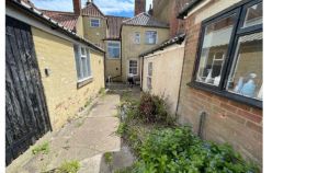 Disused storage building behind high street shops could become new home