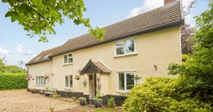 Period cottage surrounded by gardens hits market for £495,000
