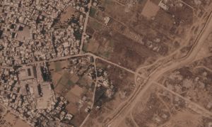 Photos show Israel building miles-long earthen barrier inside area it holds in Gaza
