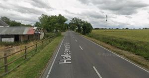 Two taken to hospital after car crash closed road for six hours