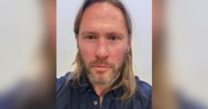 Councillor wanted for failing to appear in court misses meeting