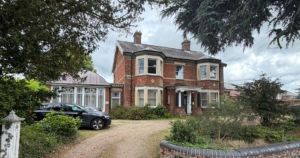 Former care home with indoor swimming pool set to go under the hammer