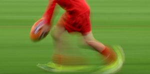 My kid’s becoming a junior football star – should they drop their other sports?