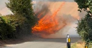 Field fire closes roads on outskirts of north Norfolk town