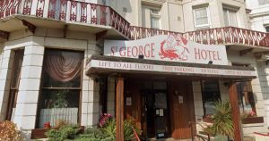 Hotel guest fights off homeless man by twisting his testicles in bedroom 'nonce' row