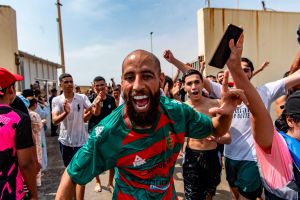 At least 18 migrants dead as thousands breach Spanish enclave in north Africa