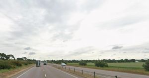 Major road closed in both directions as car towing caravan catches fire