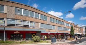 Plans to turn empty department store into 70 flats met with objections