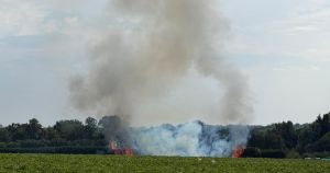 People warned to shut windows and doors as firefighters battle field blaze