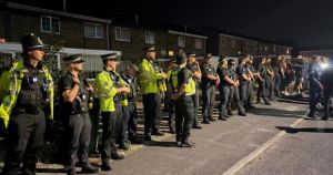 Two men arrested as ugly violence rages for third night in town