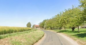 Man in his 20s dies following crash that left a car on its roof