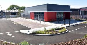 Fast food giant's restaurant empty and gathering dust as opening is cast into doubt