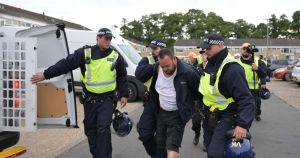 Asylum seekers evacuated again as riot police battle third night of Thetford chaos