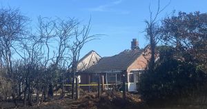 Bungalow destroyed after suspected bonfire blaze rips through gardens
