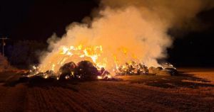 Photos show dramatic straw stack fire on farm