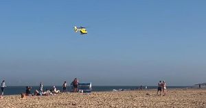 Person taken to hospital after getting into difficulty in sea