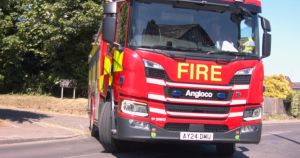 People urged to avoid area as blaze breaks out in outbuilding