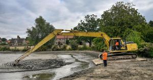 New machine brought in to save village's threatened fishpond