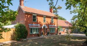 Farmhouse with award-winning holiday let in grounds on market for £800,000