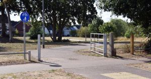 Gate dubbed a 'waste of money' to remain open... for now