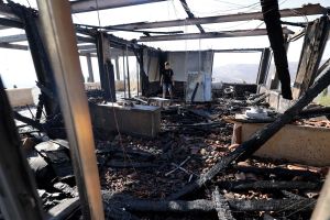 Car, building torched in apparent settler attack in West Bank; no injuries reported
