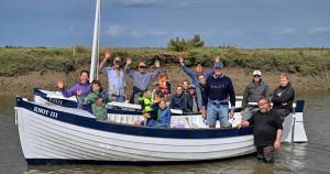 Family's cherished wooden boat takes to the sea again after refit